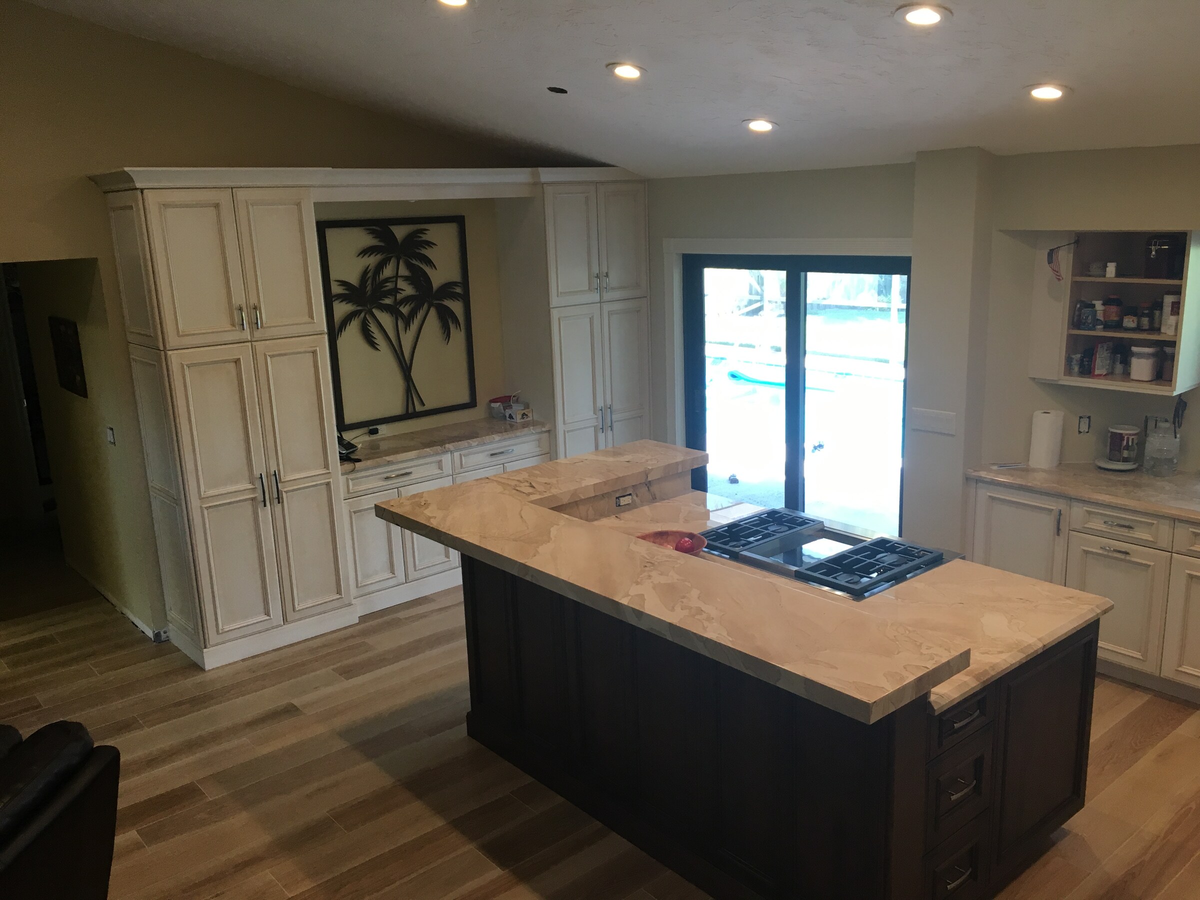 Custom kitchen with marble counters